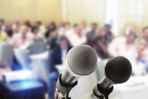 istock Two microphones wait for the speaker at a press conference 165844505
