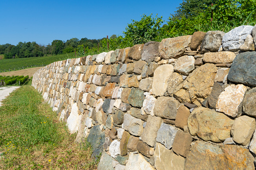 the stone retaining wall in the countryside