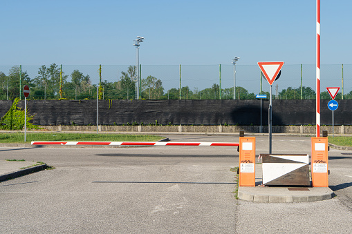 the barrier at the entrance to a car park