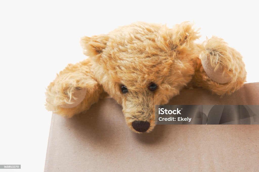 Gelbe Teddybär auf Pappkarton Blick nach unten. - Lizenzfrei Aktivitäten und Sport Stock-Foto