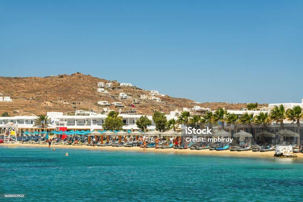 Ornos beach, Mykonos island, Greece Ornos beach, Mykonos island, Cyclades, Greece. Aegean Islands Stock Photo