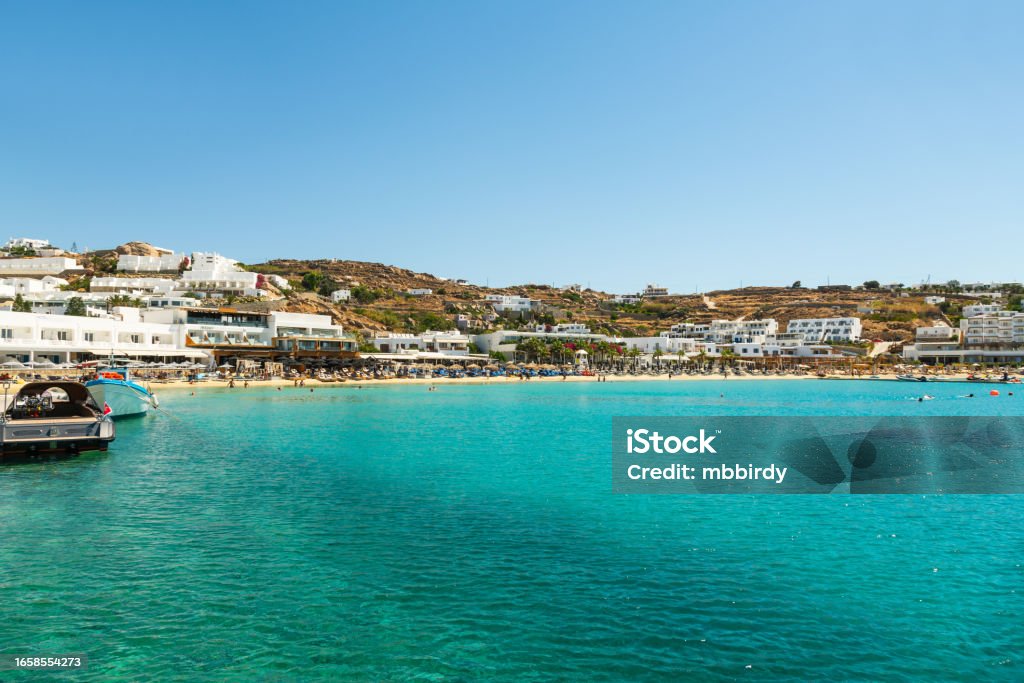 Ornos beach, Mykonos island, Greece Ornos beach, Mykonos island, Cyclades, Greece. Aegean Islands Stock Photo