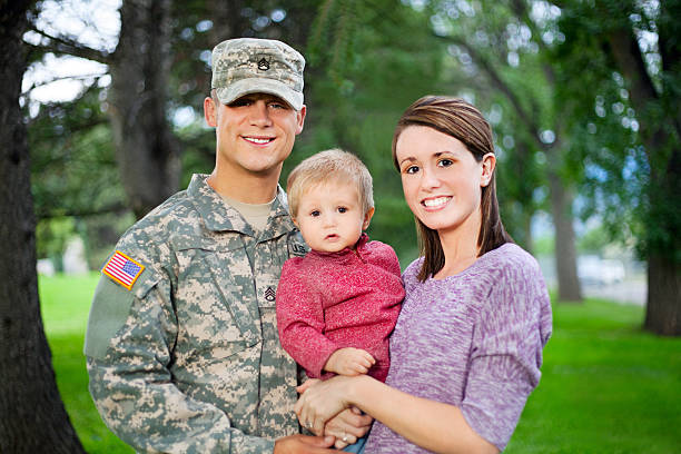 istock Army Family Series: Real American Soldier With Wife & Son 165855561