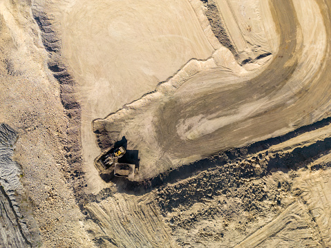 Aerial view of coal mining dump trucks