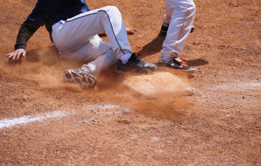 http://kuaijibbs.com/istockphoto/banner/zhuce1.jpg Baseball Player running  sliding Into Base