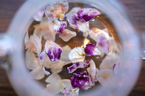 Blooming, Flowering Tea in Glass Teapot, Glass teapot with flowering tea for drinking in the morning or afternoon relaxing time of the day