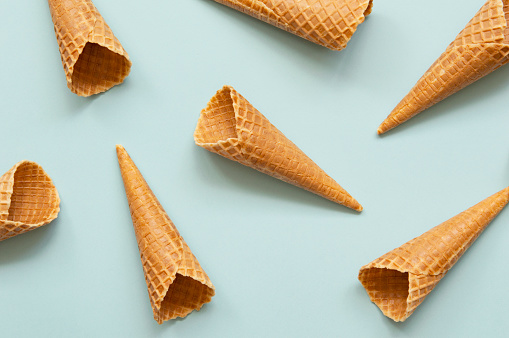 Ice cream cones on colored background