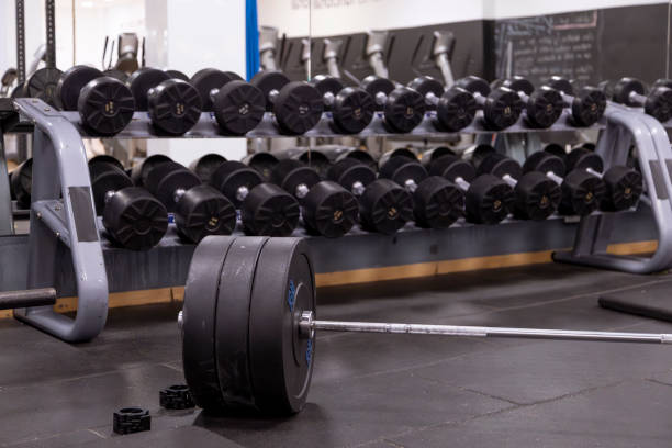 istock A weightlifting bar with weights in a gym 1658590949