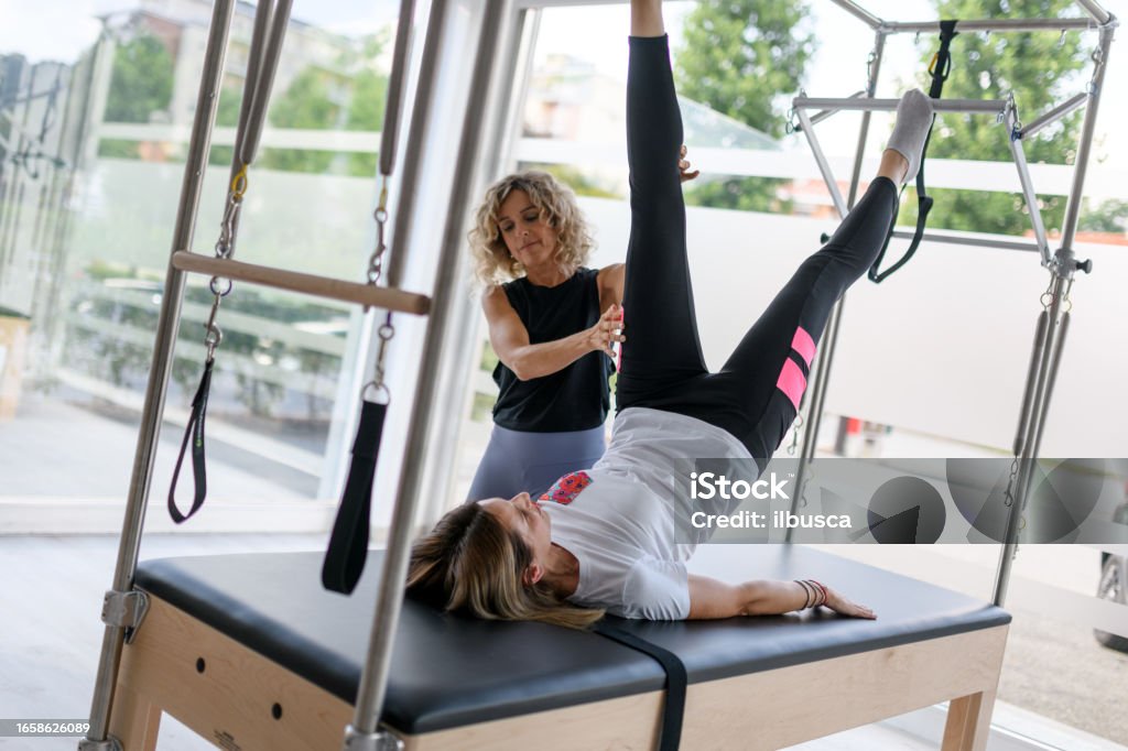 Table Machine Gym Pilates Studio Gym Woman Using Trapeze Table Machine Stock Photo ...
