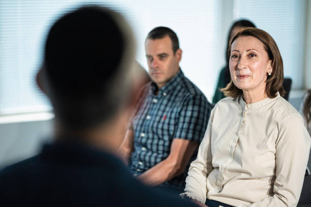 istock Mature Jewish market agent leading group training session. 1658634558