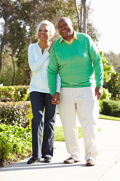 istock Senior Couple Enjoying Walk Together 165864148
