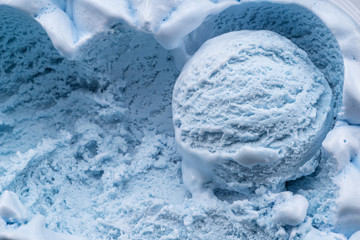 Structure of frozen ice cream close up. Ice cream background.