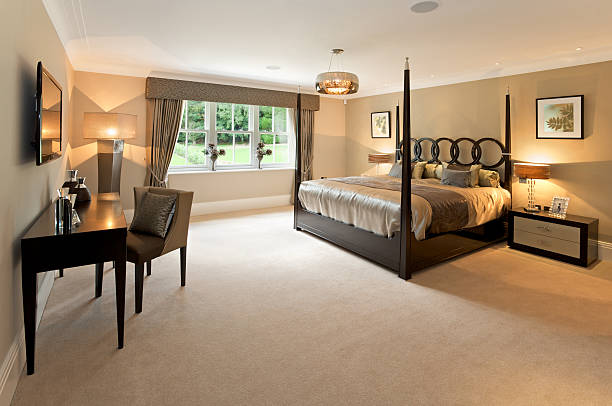 istock master bedroom with four poster bed 165866214