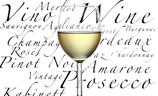 White wine against text background