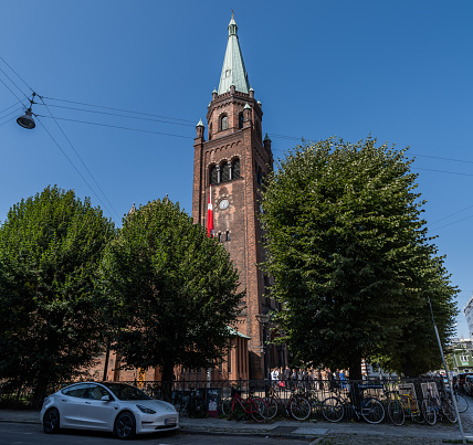 Copenhagen, Denmark - September 02, 2023: St. Matthew's Church in the district Vesterbro in Copenhagen was built in 1880, in Romanesque Revival architecture.