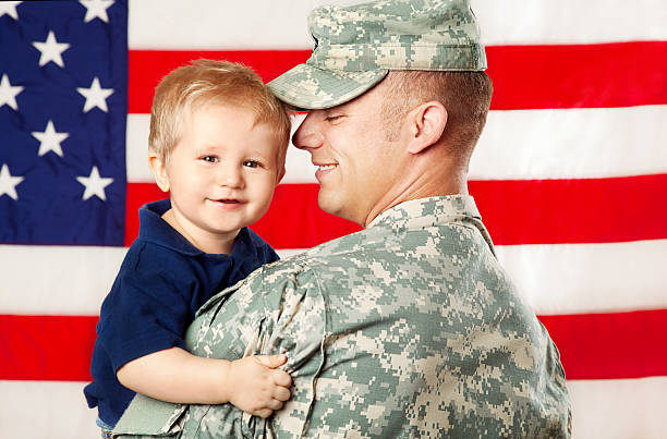istock Army Family Series: Real American Soldier With Son 165868524