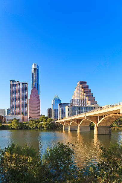 Austin Skyline with Congress Avenue Bridge A view of the updated June, 2011 Austin, TX skyline, and the famous Congress Ave. Bridge avenue stock pictures, royalty-free photos & images