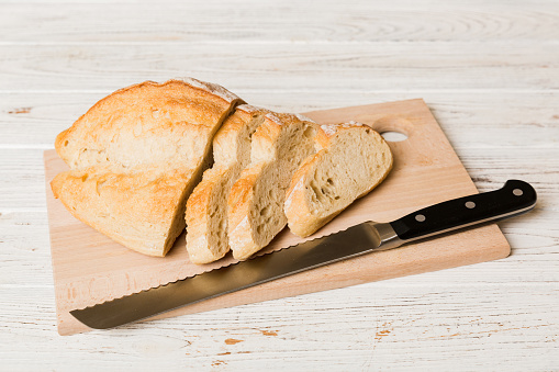whole grain bread on cutting board