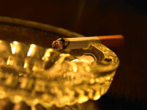 istock cigarette rest at the ashtray with smoke 1658698108