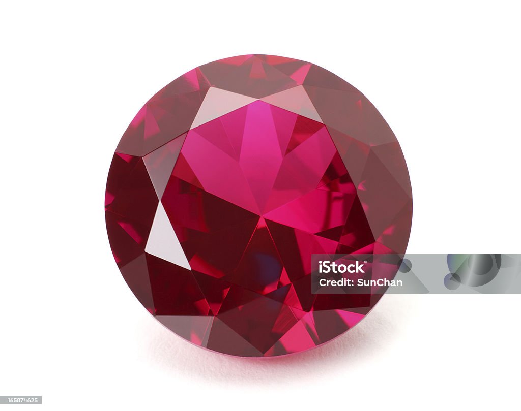 A shiny red ruby gemstone on a white background Ruby gemstone isolated on white.  Ruby Stock Photo