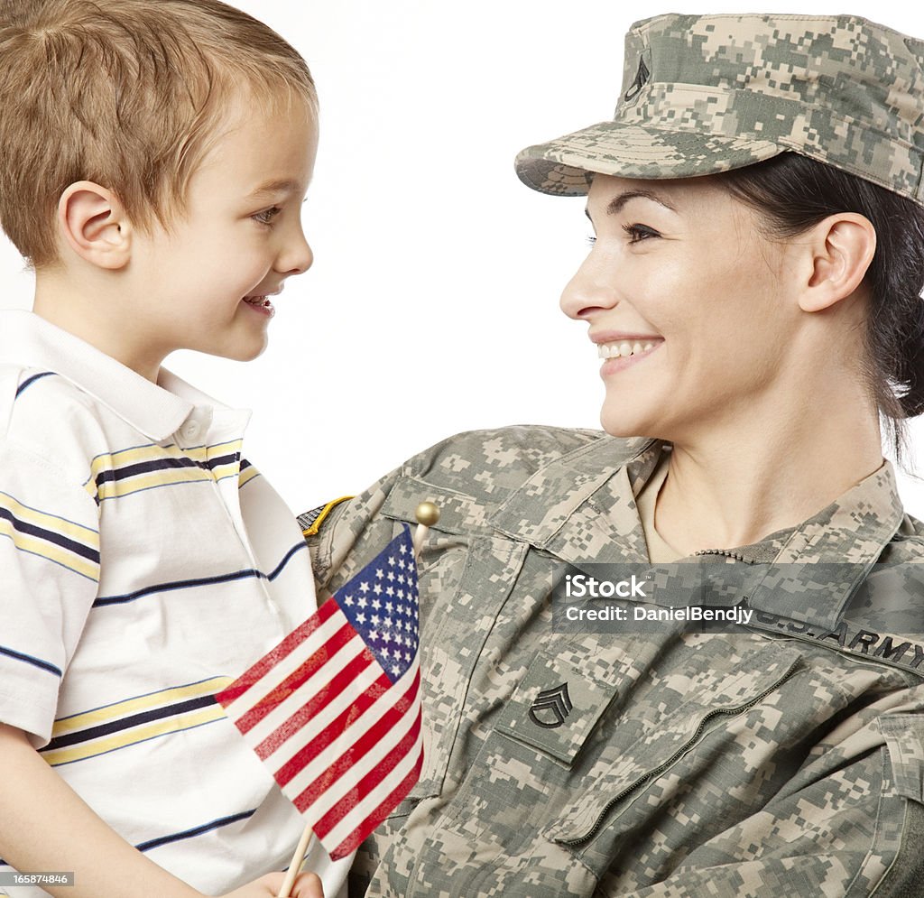 Female American Soldier with Son Female American soldier and son. Armed Forces Stock Photo