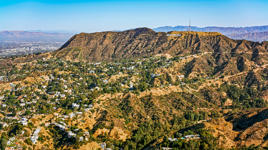 City Of Los Angeles, CA / USA - July 27, 2022: Aerial view of Hollywood sign on Mount Lee, Hollywood, City Of Los Angeles, California, USA.

The Hollywood Sign is an American landmark and cultural icon overlooking Hollywood, Los Angeles, California.