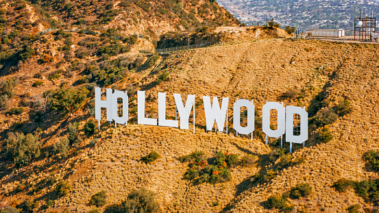 City Of Los Angeles, CA / USA - July 27, 2022: Aerial view of Hollywood sign on Mount Lee, Hollywood, City Of Los Angeles, California, USA.\n\nThe Hollywood Sign is an American landmark and cultural icon overlooking Hollywood, Los Angeles, California.