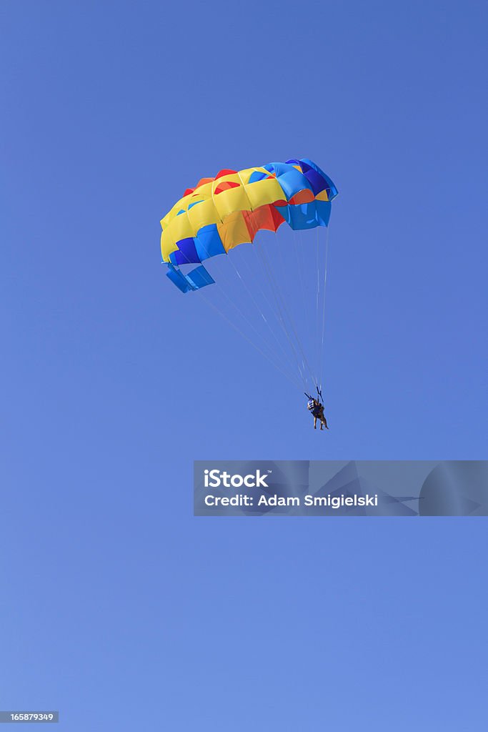 parasailing parasailing on blue sky Parachute Stock Photo