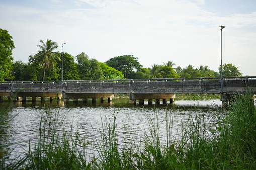 Long concrete bridge on the river