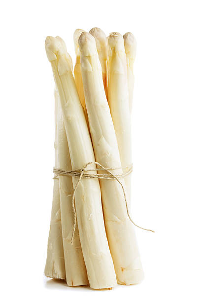 bundle of asparagus bundle of asparagus on white asparagus stock pictures, royalty-free photos & images