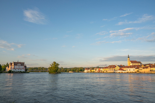 Inn river at the town of Schärding in Austria during a springtime sunset. The river Inn is the largest river flowing into the Danube (Donau), the longest river of Europe.