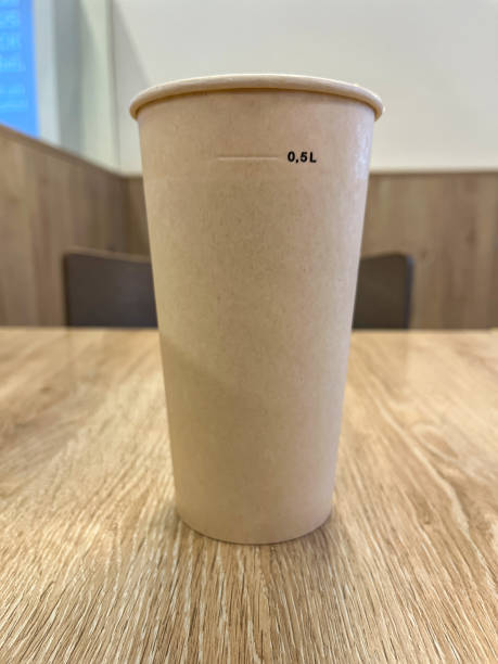 istock Paper Cup with Beverage on the Table in the Cafeteria 1658825234
