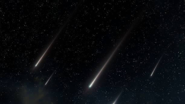 istock Shooting stars on a dark background. 1658830723