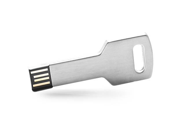 флэш-накопитель usb подключеный создана в качестве ключевого на белом фоне - encryption usb flash drive security system security стоковые фото и изображения