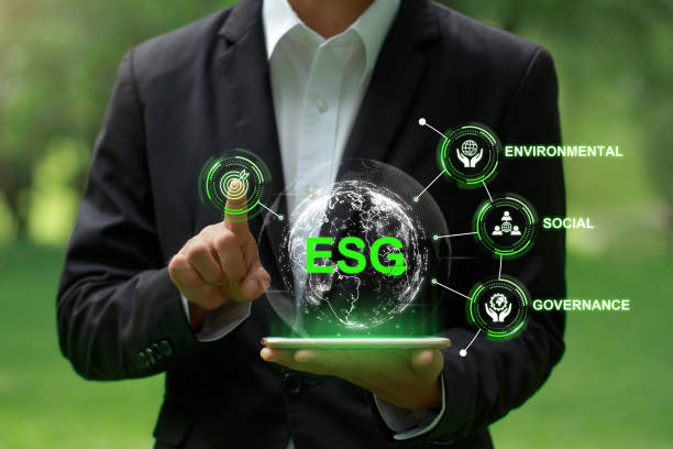 istock ESG Concepts. Environmental, Social and Corporate Governance.Businessman pressing Target button on the screen. Challenging ESG goals. ESG impact investing. Ethical and sustainable investing. 1658855372