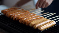 istock Thai-style street food offers a diverse selection of grilled sausages and meats. 1658855911