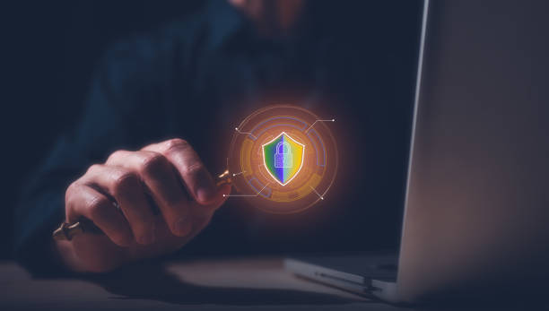 istock Hand holding magnifying glass with padlock in concept of cyber security internet privacy data protection, protecting business financial data personal information on digital devices, data governance 1658861390