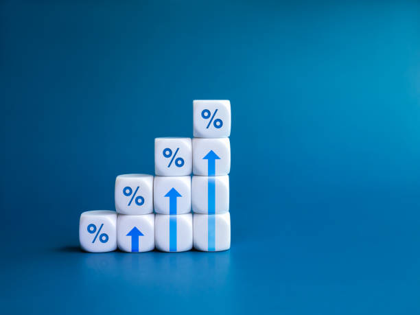 istock Rise up arrow on white cube blocks, bar graph chart steps with percentage icon isolated on blue background. Business growth process, profit, wealth, leader trends, economic improvement concepts. 1658861936