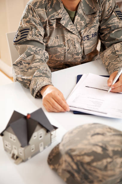 istock Air Force Uniformed Personel with Real Estate Paperwork 165886333