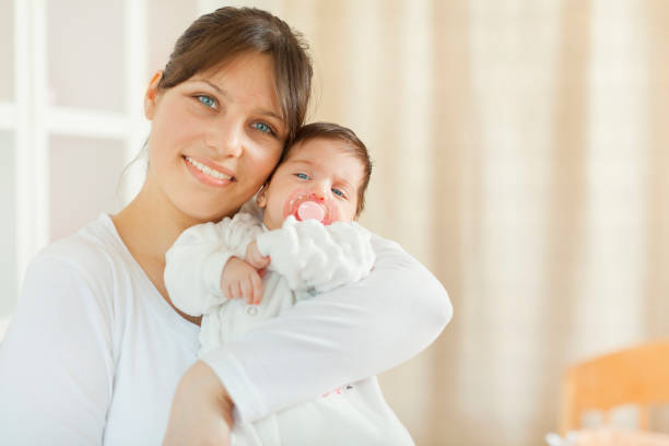 Mother with baby girl stock photo