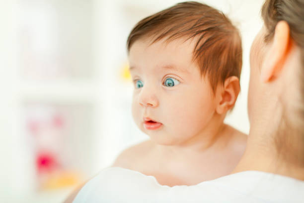 Supprised baby stock photo