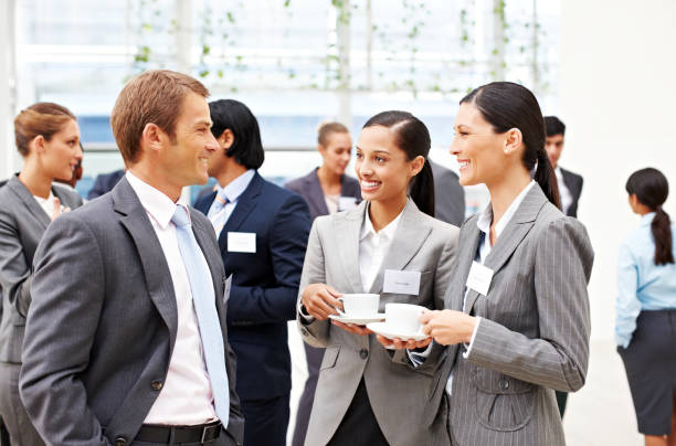 istock Business People Conversing at a Conference 165886646