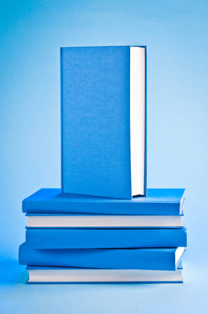 istock Best-seller blue book on top of stack books, isolated 165886877