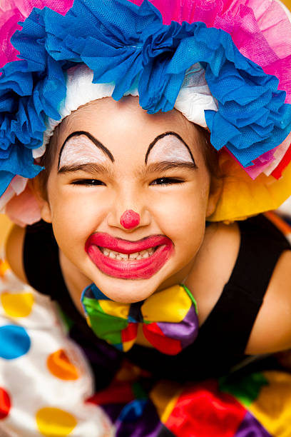 Little clown Little girl dressed as a clown. carnival children stock pictures, royalty-free photos & images