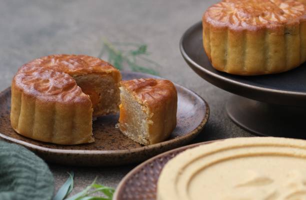 istock Egg yolk moon cake on a brown plate. 1658881150