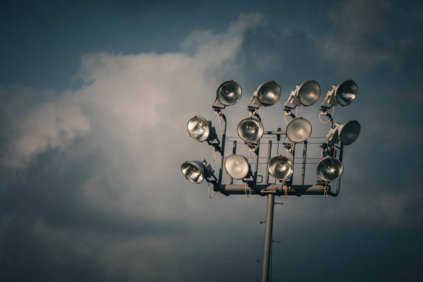 istock field lights just before they are needed at sunset 1658881285
