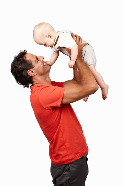 istock Father carrying his son and smiling 165888327