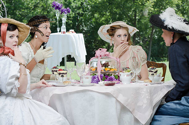 istock Young victorian woman gossiping 165889763