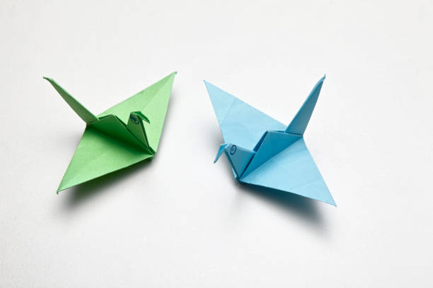 istock Origami bird - crane 1658901531