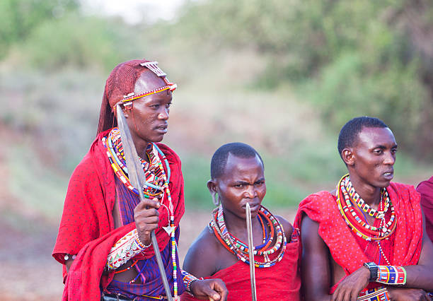 istock Three young maasai warriors with spears and traditional dress. 165890905